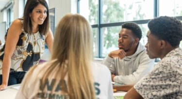 a group of people working together at Wates