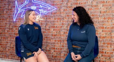 Rugby player Georgia and Wates' Kerry in the media room