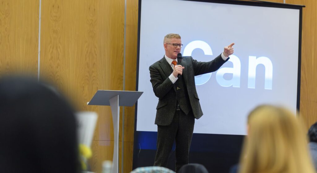 motivational speaker at promoted trainee event