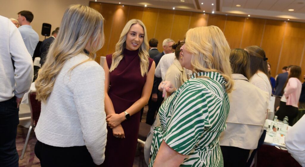 a group of women chatting at Wates' promoted trainees event