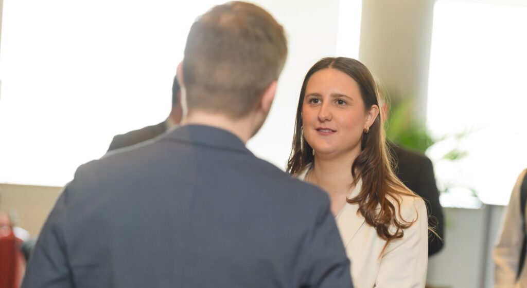 people chatting at Wates promoted trainees event