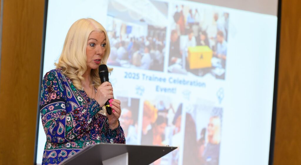 alison reid head of early careers talking at the trainee celebration event