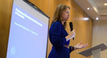 cressida curtis head of sustainability speaking at the trainee celebration event