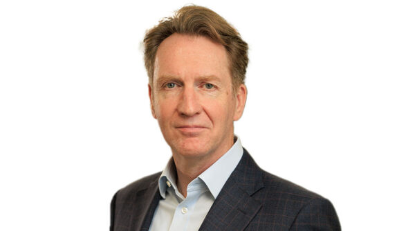 Image: A professional headshot of Eoghan O'Lionaird, CEO of Wates Group